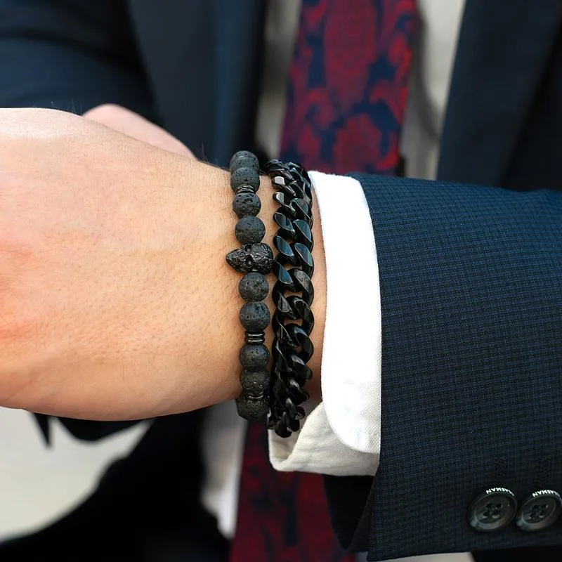 Crucible Los Angeles Polished Stainless Steel Skull and Black Lava Strech Bracelet
